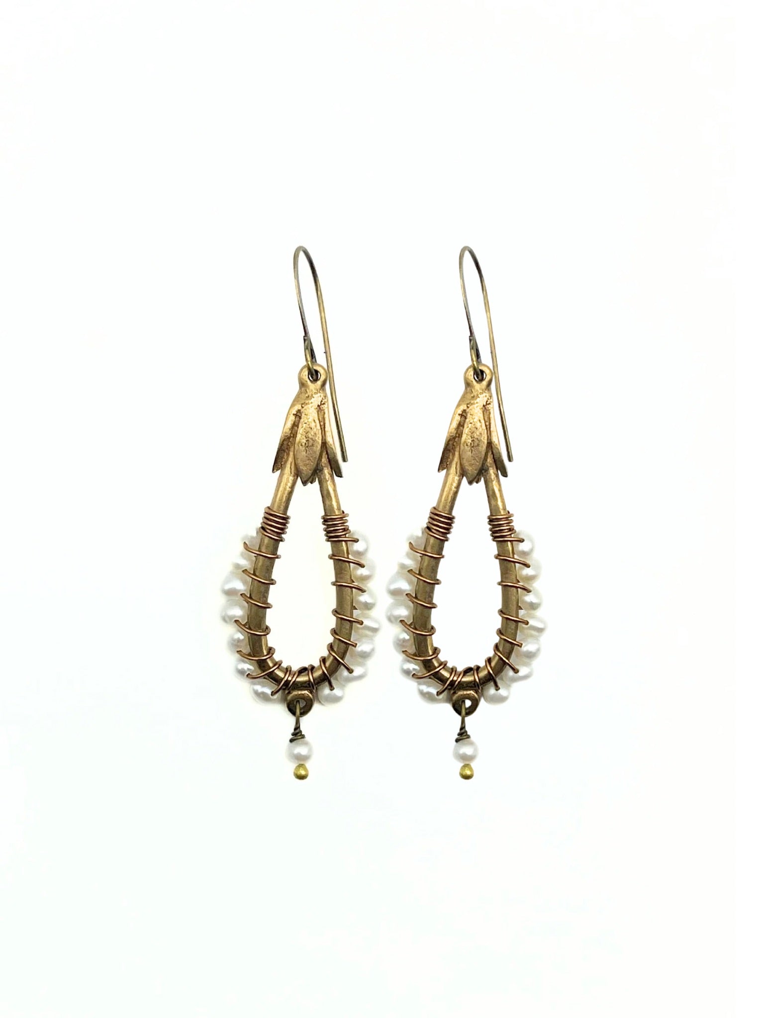 Precious pearl wrapped drop earrings