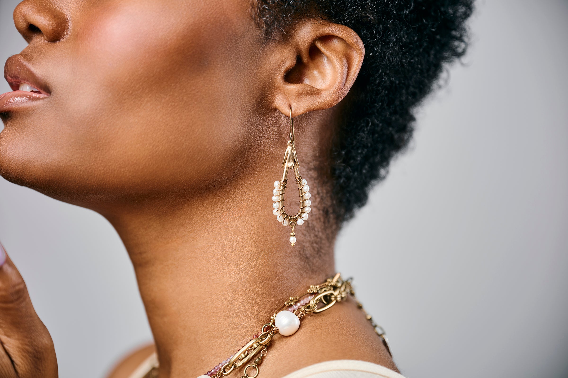 Precious pearl wrapped drop earrings